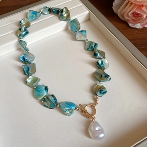 Bohemian seashell beaded necklace with teal shells, baroque pearl and golden OT clasp