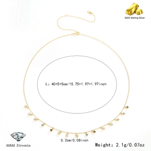 Detailed view of gold S925 sterling silver chain with tiny colorful zirconia tassels
