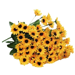 Artificial yellow sunflower bouquet with green leaves in a realistic silk floral arrangement