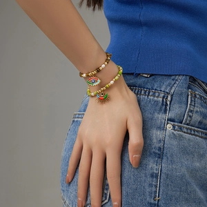 Set di bracciali boho con occhio del diavolo, pietre occhio di tigre e perline dorate