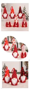 Detailed view of handmade plush Valentine gnomes with heart patterns and warm lighting