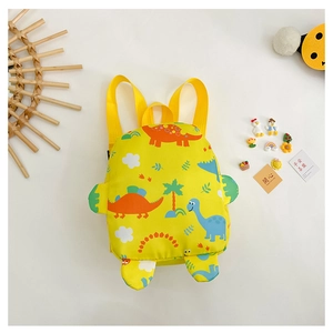Detail of yellow kids cartoon dinosaur backpack with 3D fins and vibrant pattern