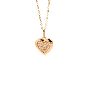 Golden heart pendant necklace with shimmering zircon inlay on a minimalist cable chain