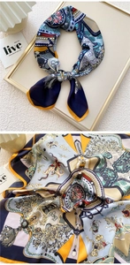 Close-up of elegant silk scarf featuring vintage ethnic prints in royal blue and yellow