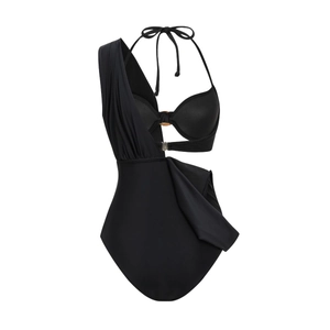 Detailed close-up of black one-shoulder swimsuit with waist cutout and gold buckle