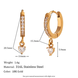 Detail of 18K gold plated heart earrings with zircon inlay and 316L stainless steel texture