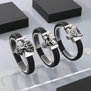 Men's retro braided leather bracelets with wolf, skull, and lion head steel charms
