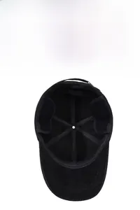 Detail of warm winter baseball cap featuring soft fleece lining and foldable ear flaps