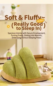 Detail of soft plush interior on snail pet bed with sleeping cat for warmth