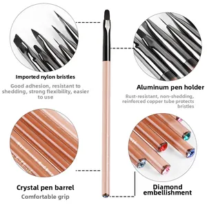 Detail view of acrylic nail art liner brush with nylon bristles and crystal rhinestone handle
