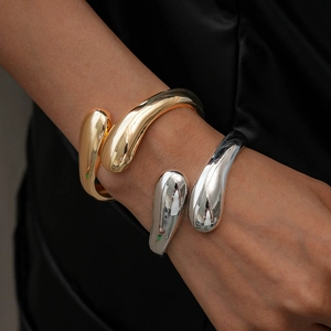 Chic polished metal geometric crossover open cuff bangle in gold and silver finish