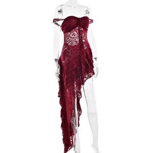 Detail of burgundy lace dress with ruffled asymmetrical hemline and sheer texture