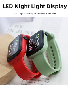 Detail view of red and green square LED sports watches with soft silicone straps