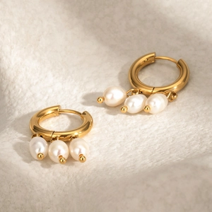 Gold stainless steel hoop earrings featuring three elegant white drop pearls for women