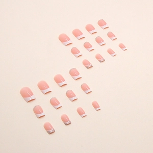 Classic pink French tip press-on nails with silver glitter accents in a short square shape