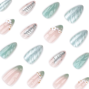 Fresh mint green cat-eye press-on nails with 3D floral and silver butterfly designs