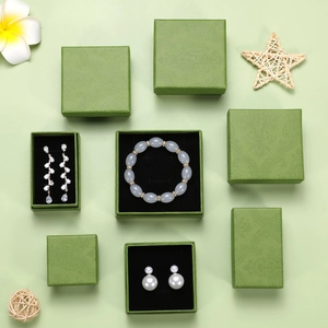 Vintage green jewelry gift boxes with floral patterns for necklaces and pearl earrings
