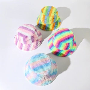 Colorful striped faux rabbit fur bucket hats for women in various rainbow patterns