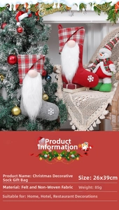 Detail of Christmas gnome stockings with white beards and snowflake embroidery