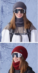 Close-up of thick knit winter hat and neck warmer set with warm fleece lining texture