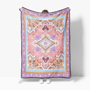 Bohemian ethnic print flannel blanket in vibrant pink and orange for sofa or nap