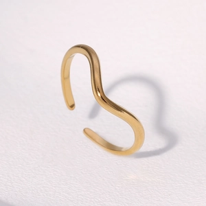 Minimalist gold wavy open ring with adjustable S-shape design in polished stainless steel