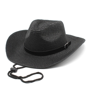 Detail of black straw cowboy hat with leather band, silver buckle and chin strap