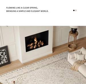 Close-up of beige and grey vintage pattern carpet in a cozy living room setting