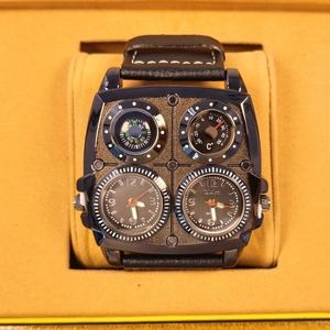 Oulm big dial dual time quartz watch with leather strap and compass in a yellow gift box