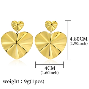 Retro gold heart drop earrings with radiant textured finish and size dimensions