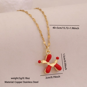 Detail view of gold necklace with red balloon dog pendant and precise measurements