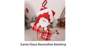 Detail of red Christmas stocking with Santa Claus doll and plaid bone pattern hanging