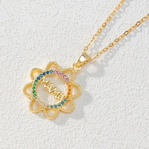 Golden sunburst MAMA pendant necklace featuring colorful zircon crystals on a fine chain