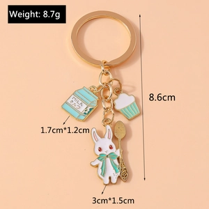 Detail shot of rabbit and milk box keychain with specific size and weight dimensions