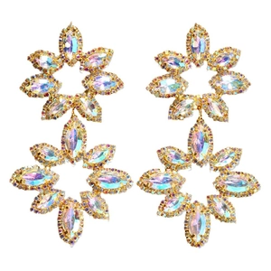 Exaggerated golden flower dangle earrings with iridescent rhinestones and marquise gems