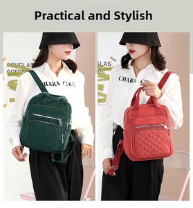 Quilted nylon backpack detail featuring side pocket and decorative zipper pockets