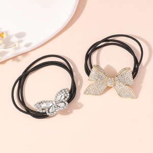 Elastic hair ties set with rhinestone butterfly charms in gold and silver finish