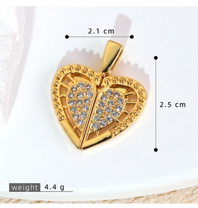 Detailed view of gold heart pendant with cubic zirconia and 2.5cm height dimension