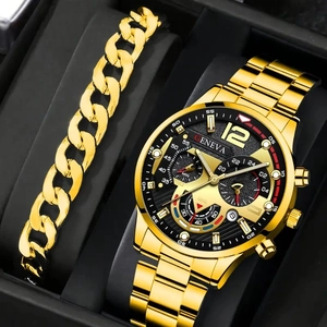 Detailed close-up of gold Geneva chronograph watch and curb chain bracelet in a gift box