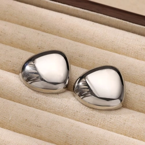 Minimalist silver irregular teardrop earrings in a velvet jewelry box for women