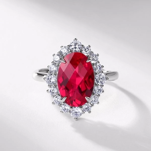 Luxurious S925 silver ring featuring a large oval red ruby surrounded by white diamonds