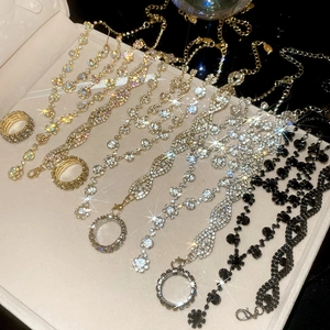 Luxurious rhinestone necklace and ring set displayed in a premium jewelry gift box