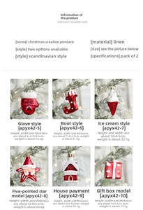 Detail of linen Christmas ornaments including gloves and stars with gold hanging cords