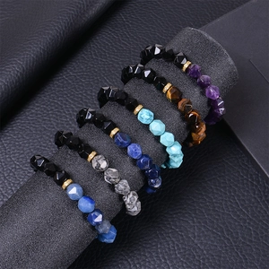 Faceted natural stone bracelets with 10mm blue agate and zircon beads on black pillars