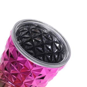 Macro shot of pink diamond texture tumbler showing geometric patterns and metallic finish