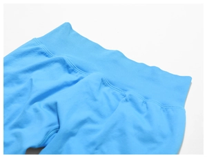 Detail of high-waisted ribbed waistband on seamless sky blue yoga leggings