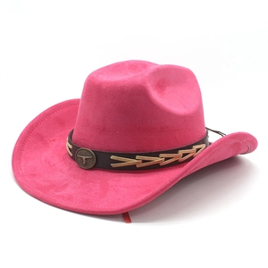 Detail of hot pink suede cowboy hat with brown leather belt and metal bull head buckle