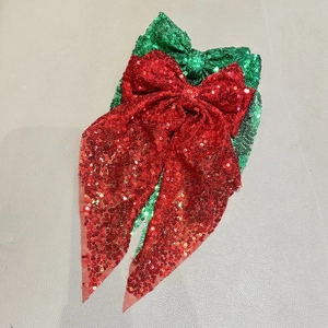 Barrettes à nœuds pailletés avec rubans en tulle aux couleurs festives rouge et vert