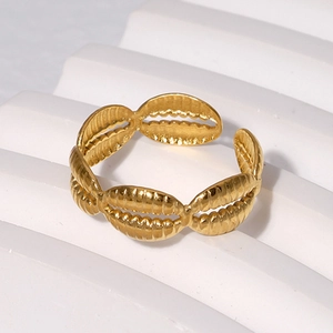 Adjustable gold plated stainless steel open ring featuring a seashell pattern design