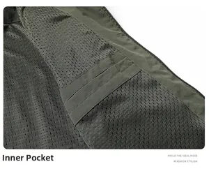 Detail view of military green jacket featuring breathable mesh lining and inner pocket